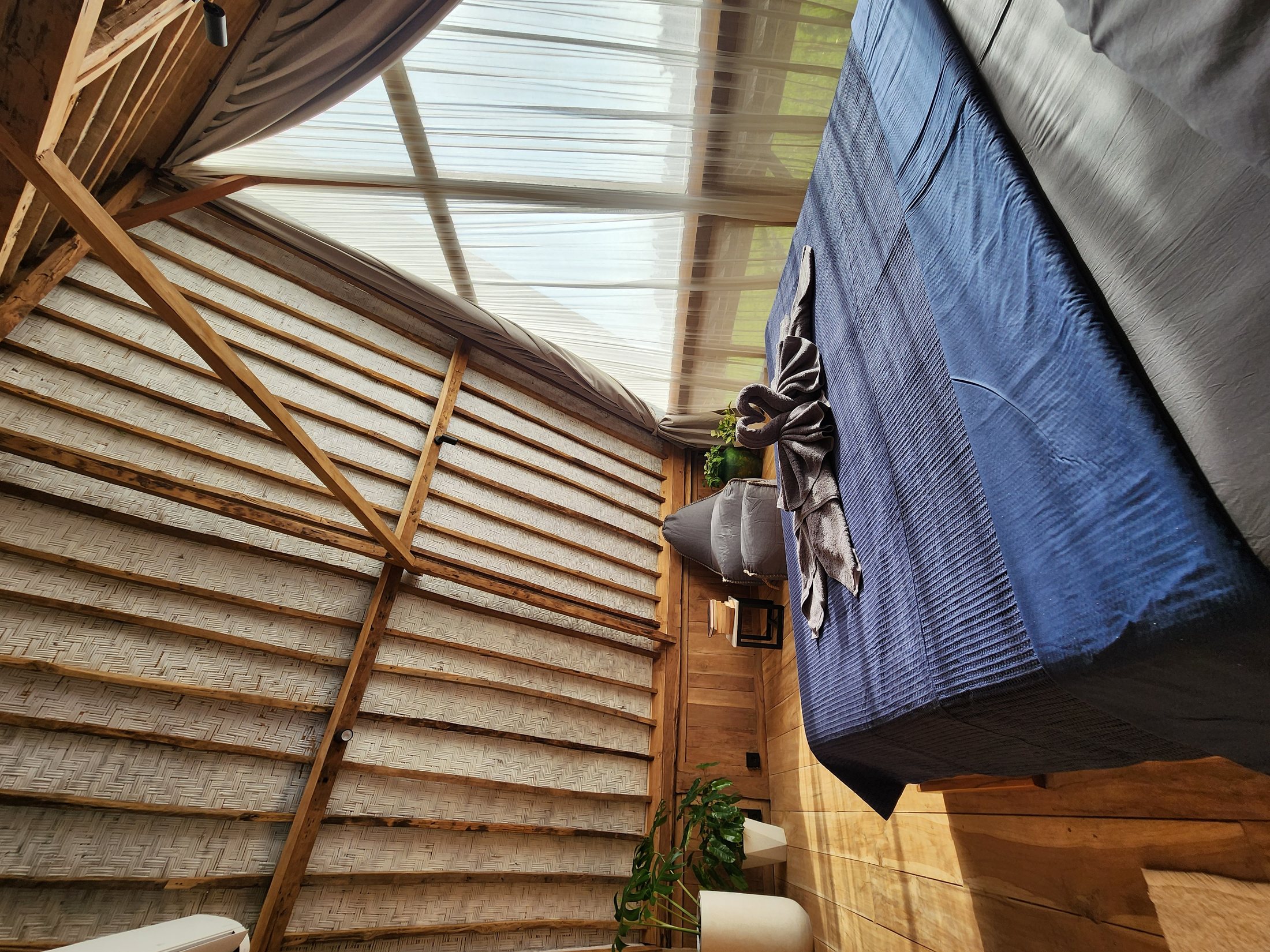 Rumah Jati loft bedroom overlooking the rice fields