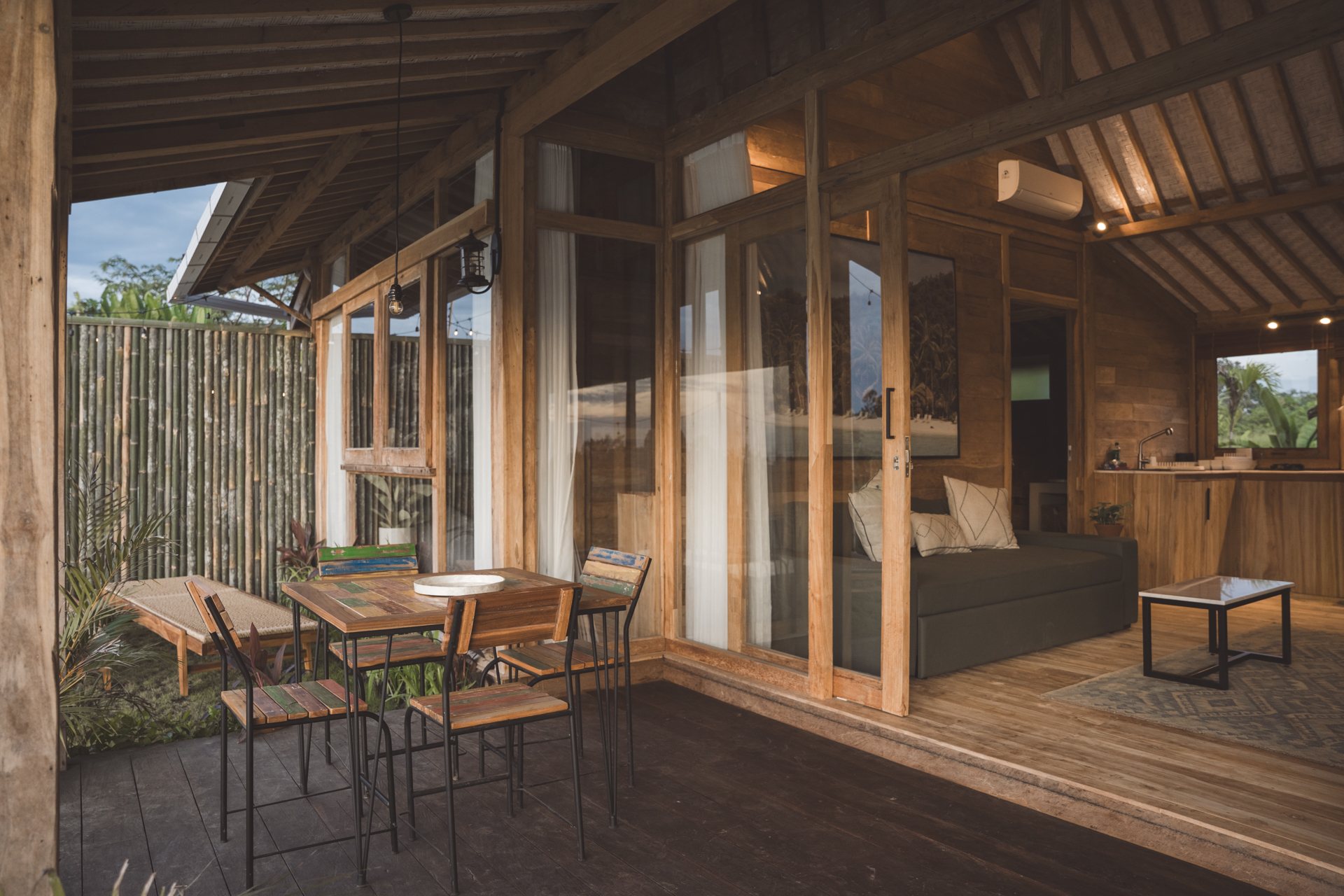 Rumah Pring living room opening onto the covered porch